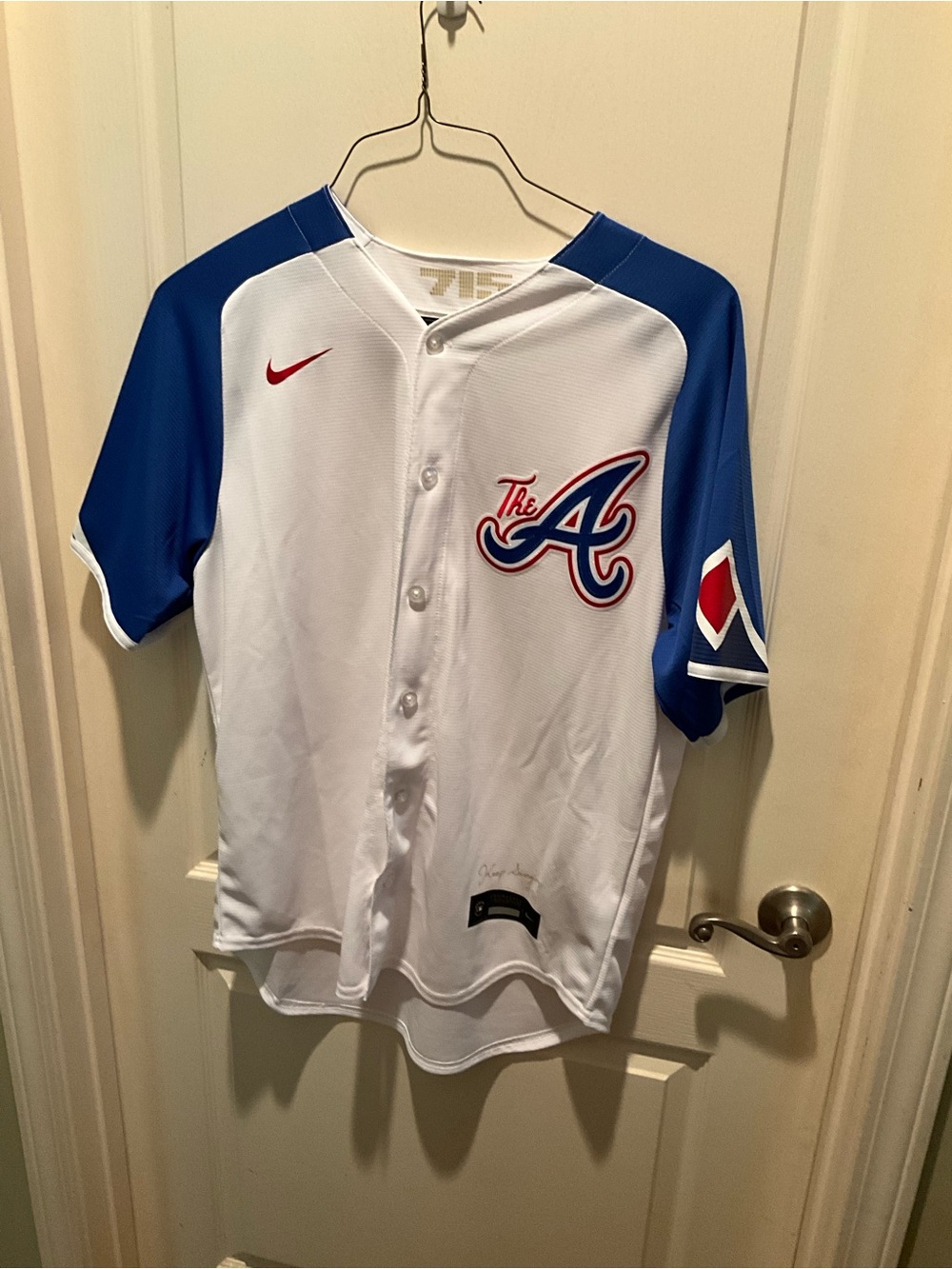 Nike White Performance Baseball Jersey with Gold Script